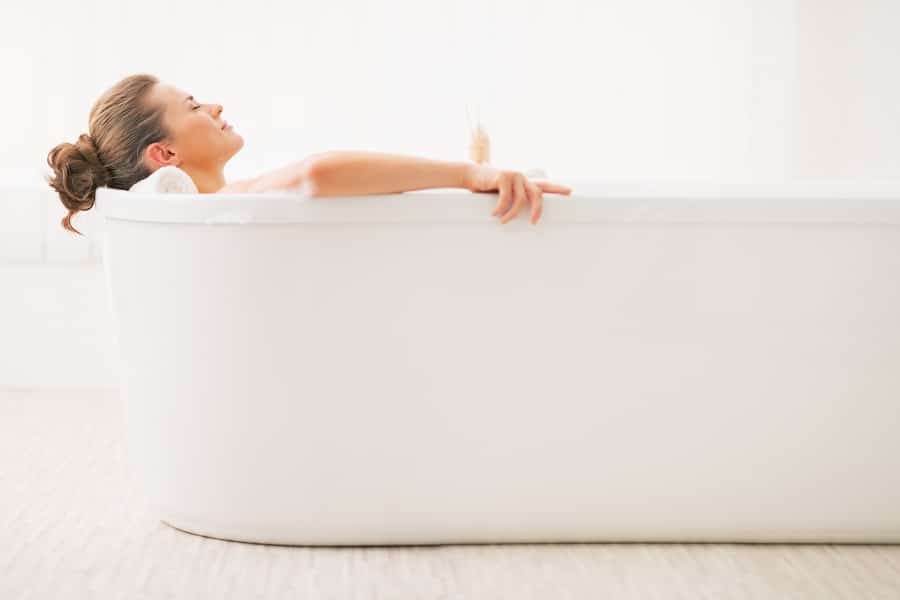 Woman soaking in bath