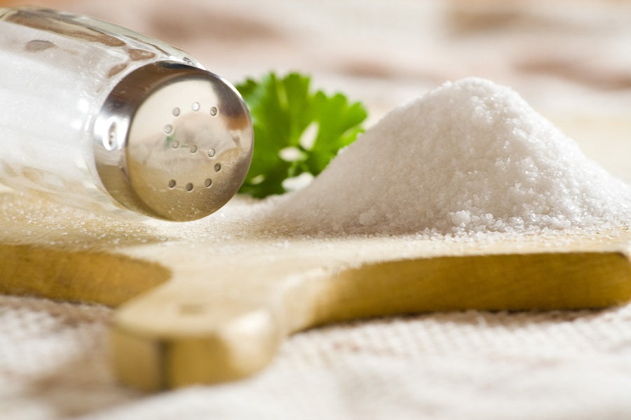 Salt on a wooden cutting board