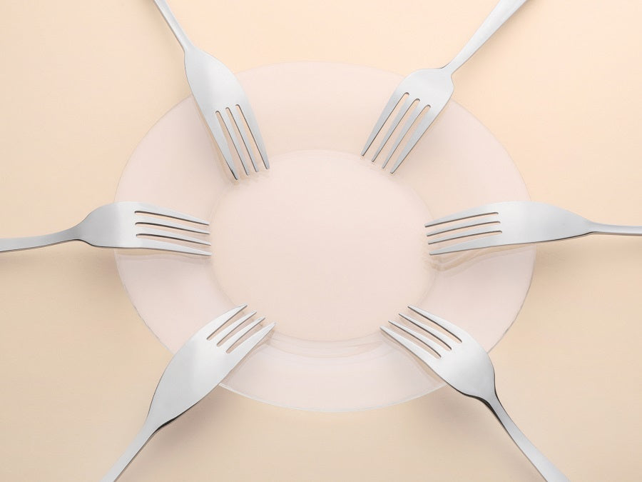 Forks on a plate for eating 6 meals a day