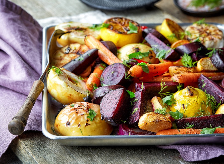 A pan of seasoned and chopped vegetables