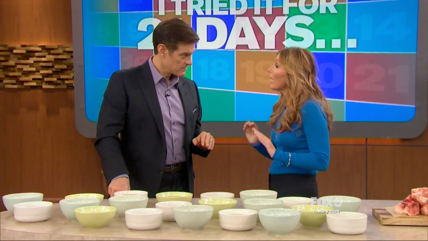 Dr. Kellyann sampling foods with Dr. Oz