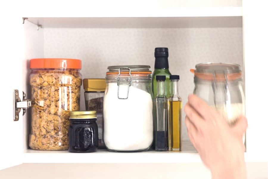 A cupboard full of glass jars
