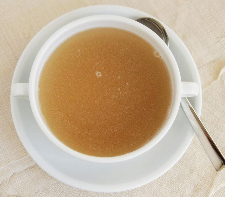 Beef bone broth in a mug