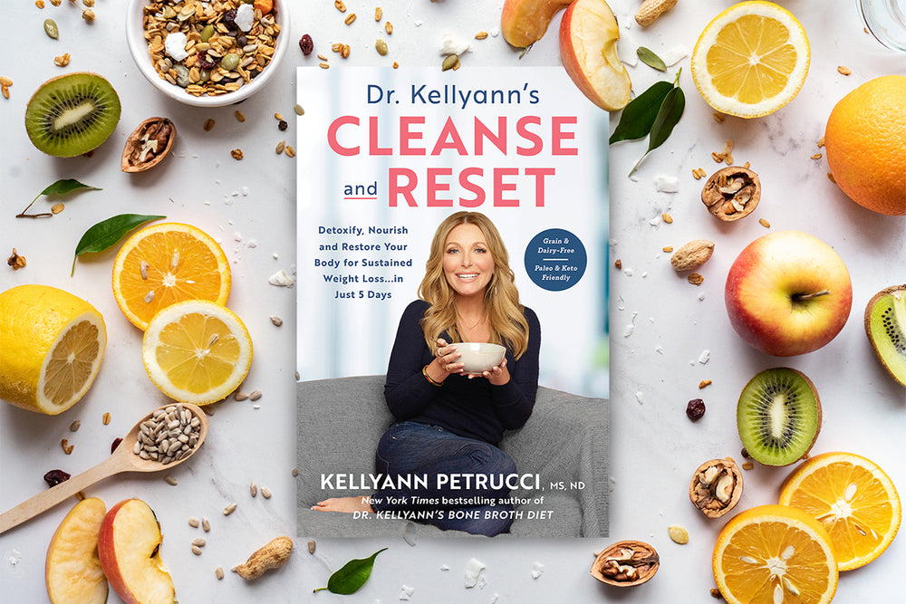 Dr. Kellyann's CLeanse and Reset with lemons, kiwi, and more surrounding