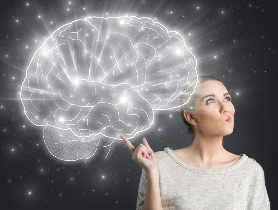 Woman and a glowing brain