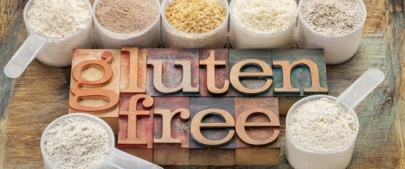 Gluten free sign surrounded by measuring cups for grain free baking