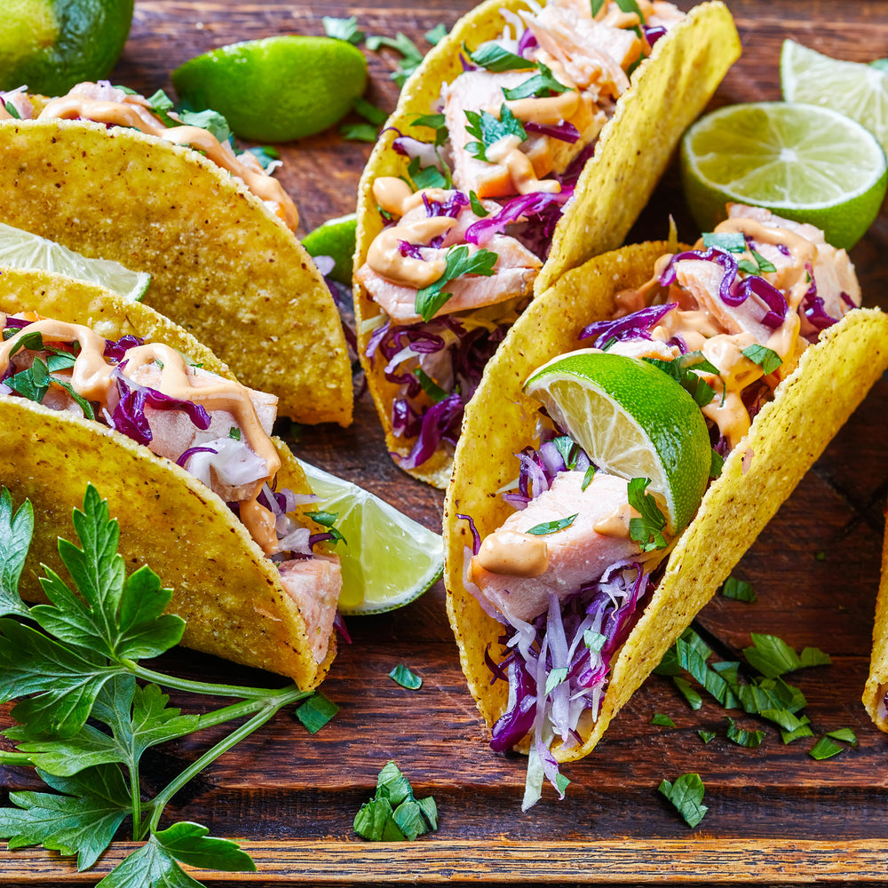 Salmon Tacos with Cabbage Slaw and Creamy Cilantro Dressing