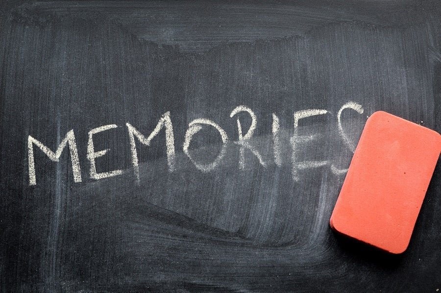 Memories being erased on a chalkboard