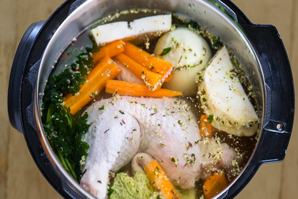 Chicken bone broth cooking in an instant pot