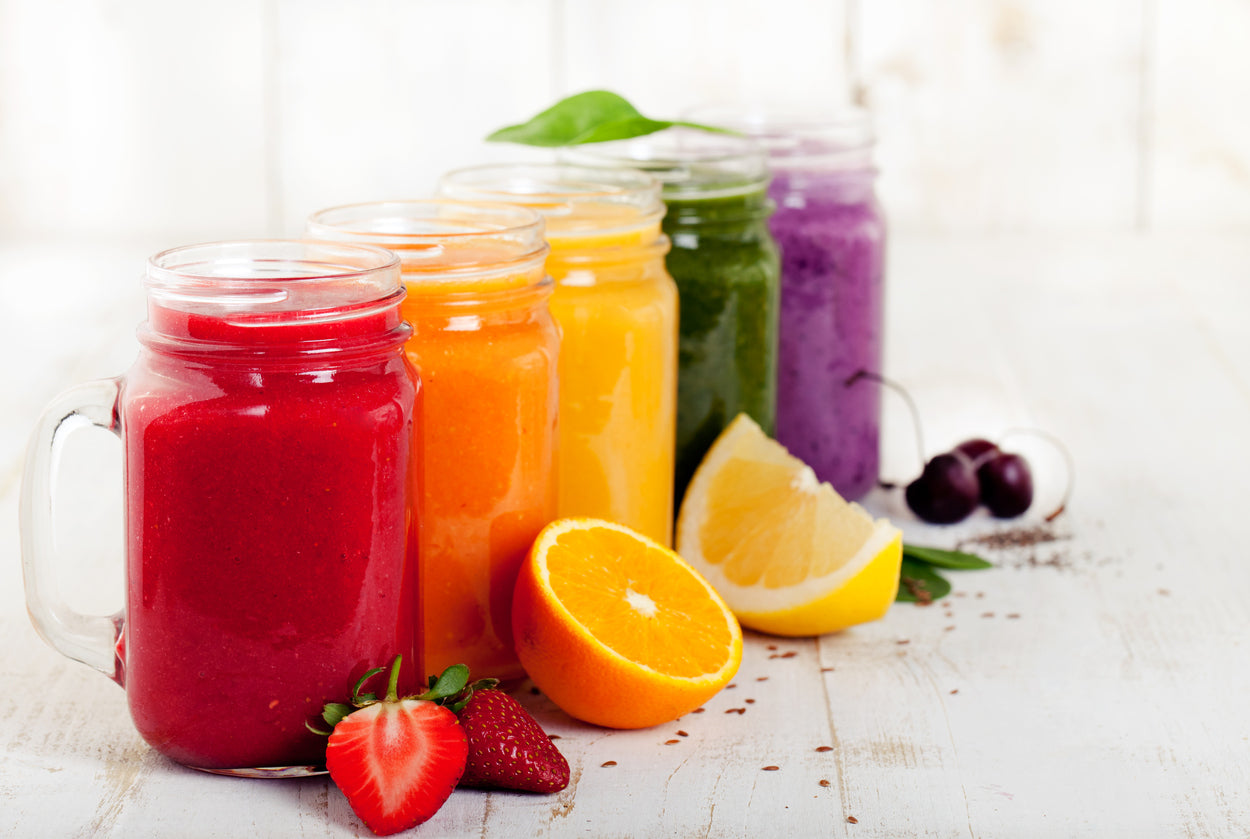 various fruit smoothies in mason jars