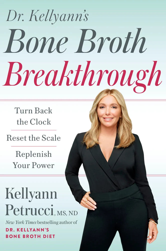 Book cover of 'Bone Broth Breakthrough' with a Kellyann in a black suit against a light blue background