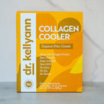 Box of Dr. Kellyann Collagen Cooler in Tropical Piána Colada flavor on a gray background