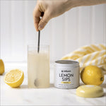 Lemon Sips container and a glass 